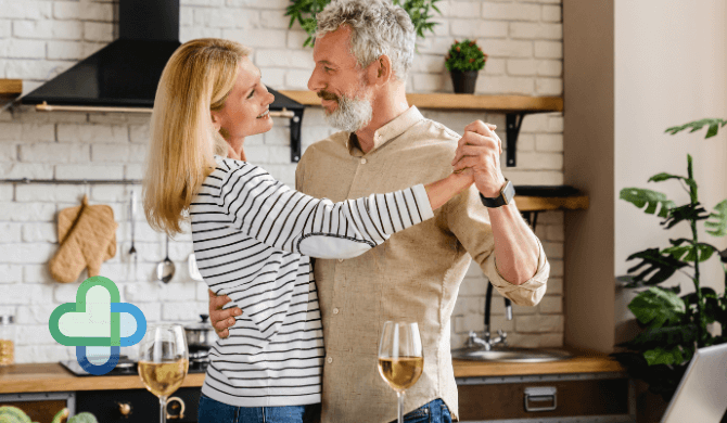 man and woman dancing in the kitchen - buy cheap flibanserin online - the family chemist
