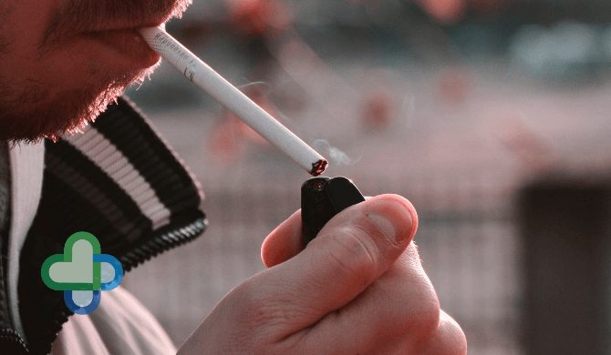 man with cigarette in his mouth - buy stop smoking treatments