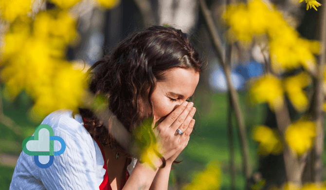 woman with hayfever sneezing - buy hay fever treatment