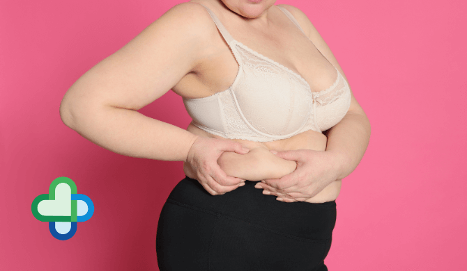 woman with obesity clenching side fat - mounjaro