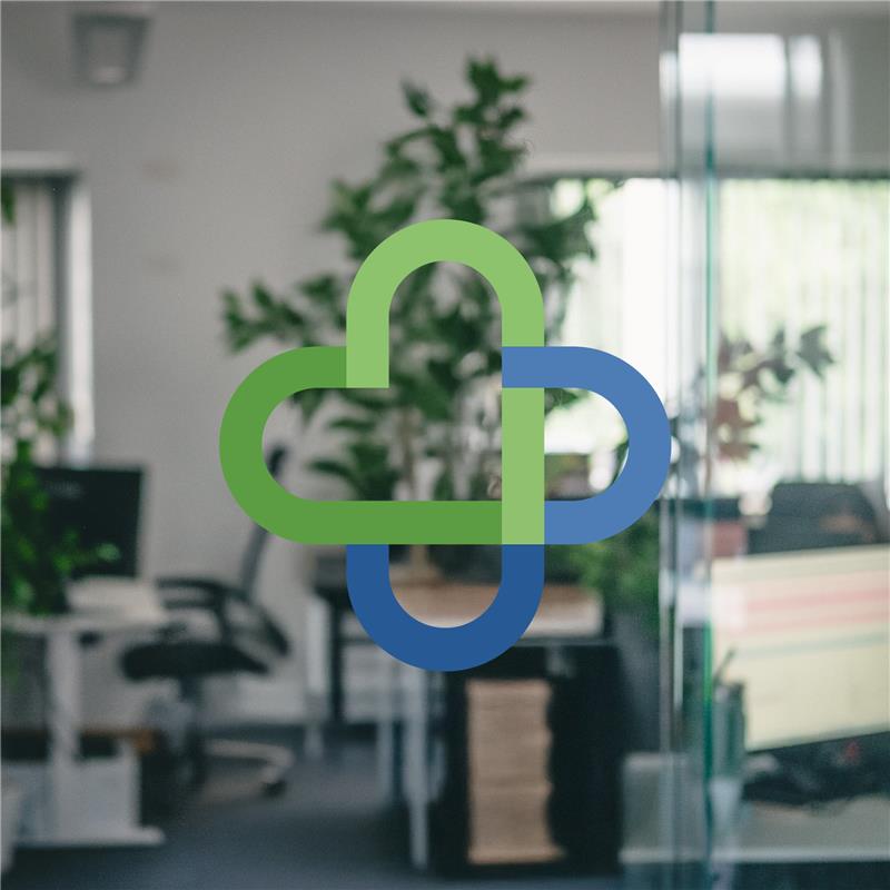 TFC logo on office background