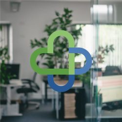 TFC logo on office background